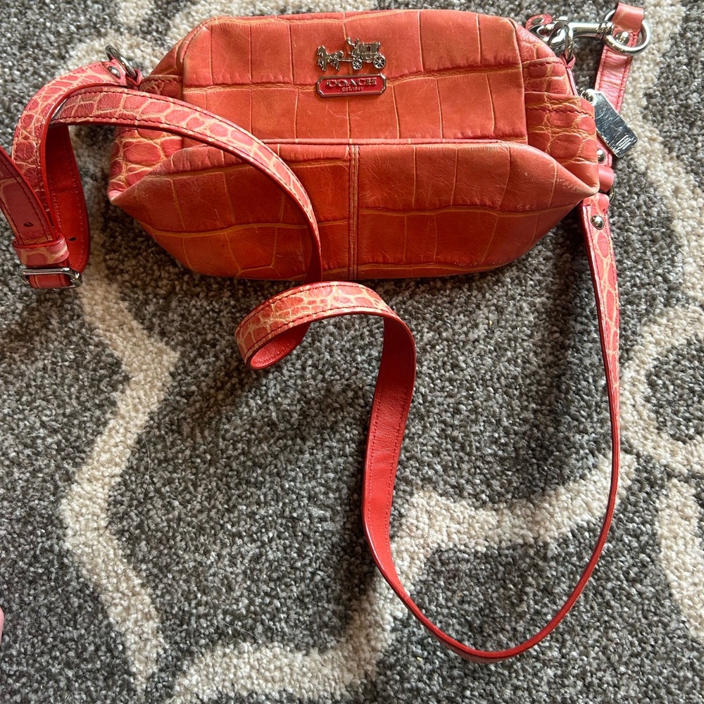 Coral alligator texture Coach crossbody bag